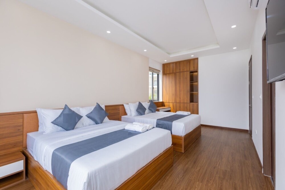 Villa Long Cung Sát Biển OdwinS38 - Khu vực phòng ngủ