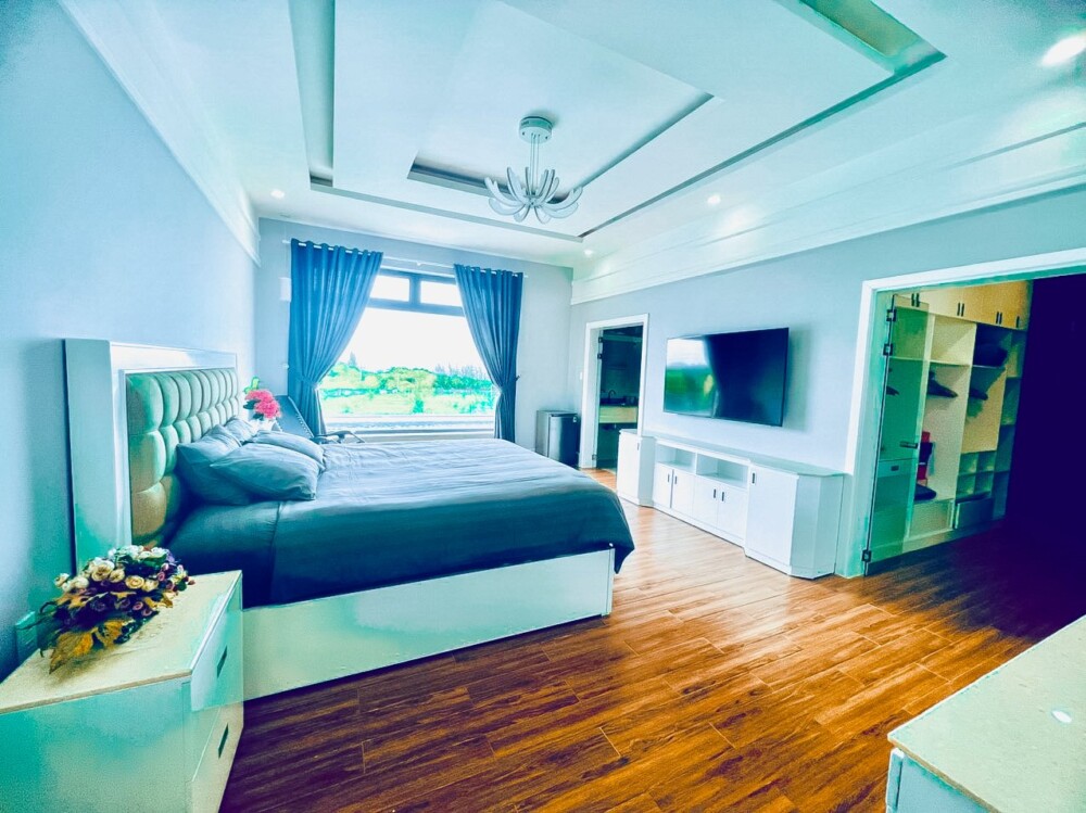 Phòng ngủ đầy đủ tiện nghi tại Odwin TT